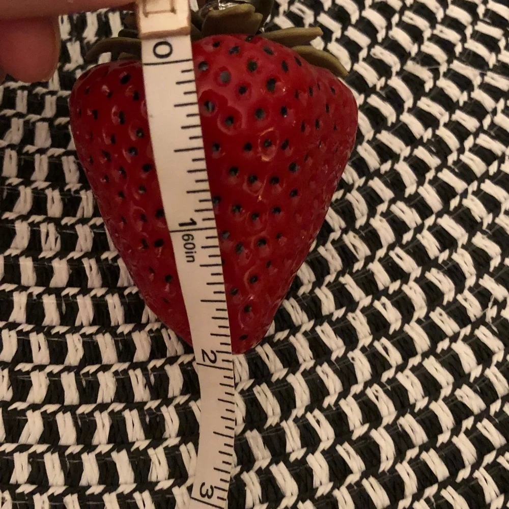 Authentic New with tag. Tory Burch Red Strawberry bag charm.